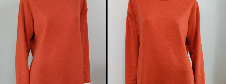 Oranssi merinovillamekko mallinuken päällä